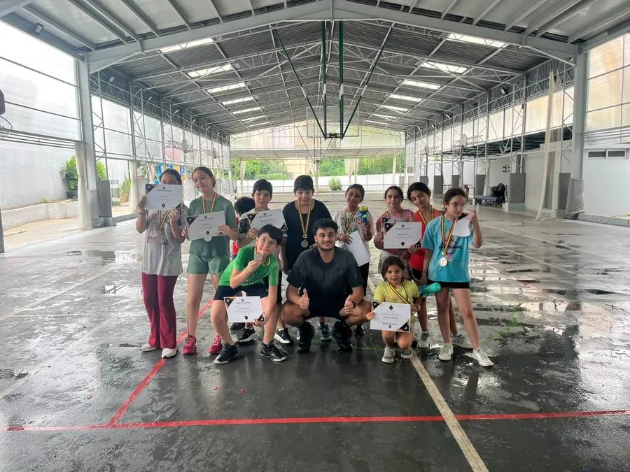 Group of students with medals